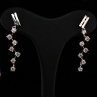 Orecchini-punti luce di brillanti pendenti